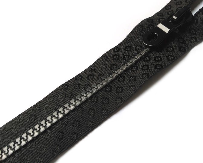 Plastic zipper with dots-designed tape